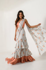 Scarlet Orange Bralette & Pista Green Ruffle Saree
