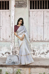 soft kota saree with zari woven zig zag border.cotton tassels on pallu.contrast zari woven banarasi silk blouse