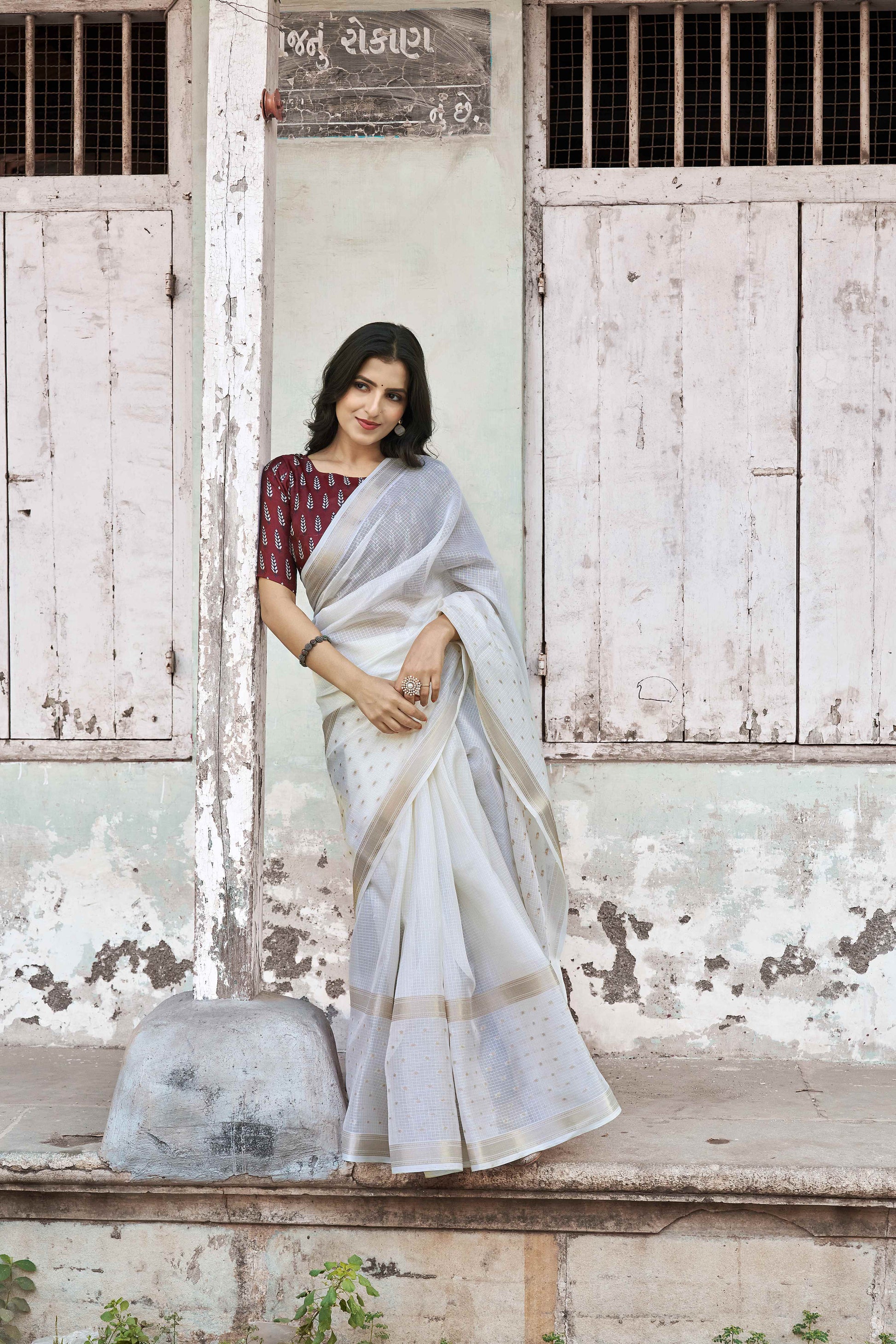soft kota saree with zari woven zig zag border.cotton tassels on pallu.contrast zari woven banarasi silk blouse