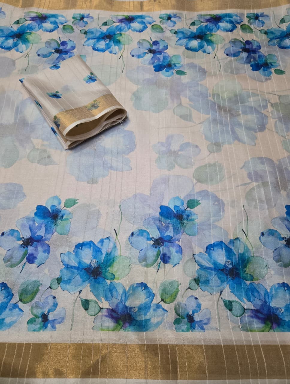 Soft Dola Silk saree with shaded style prints.