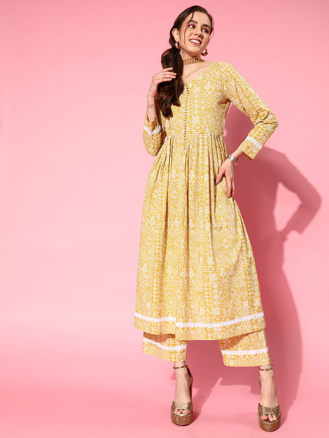 Kalini Women Mustard Printeda-Line Kurta With Front Slit,  Embellished With Fabric Potli Button In Placket, Paired With Tonal Printed Bottom
