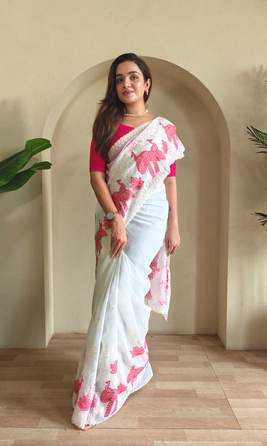 silk Saree with applique work pattern all over the Saree with embroidery and scallop  Border all over