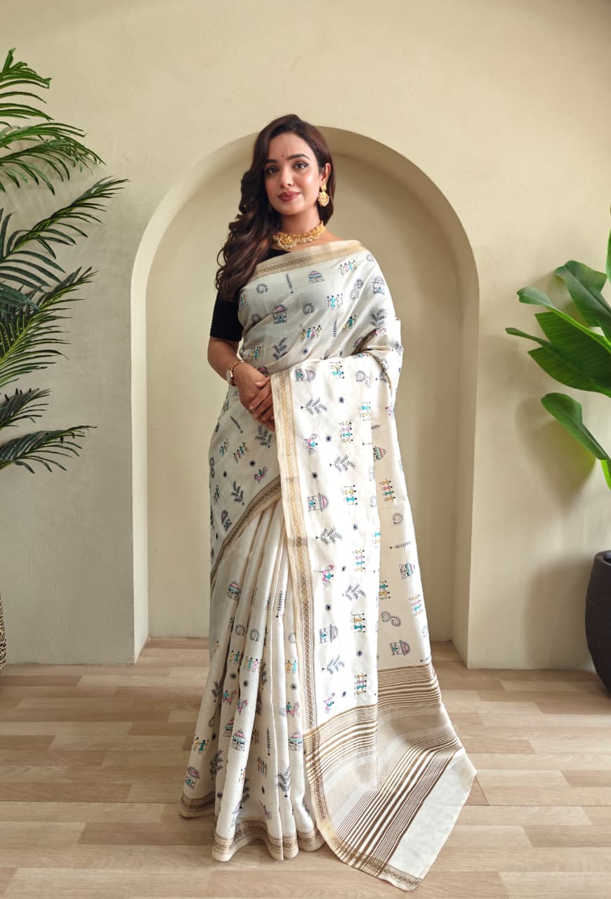 PURE LOOM TUSSAR SAREE WITH ALL OVER WORLI EMBROIDERY PATTERN,  COPPER ZARI BORDER AND ZARI WOVEN PALLU.