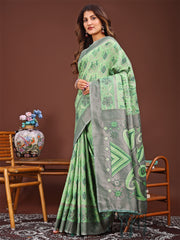 Grace in Every Thread: Pink Patola Linen Cotton Saree Woven with Cultural Elegance