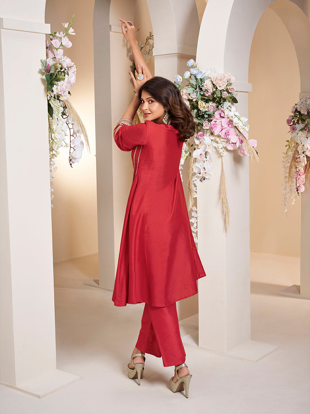 Red colour Embroiderd Anarkali Flared Kurta with Palazzos.