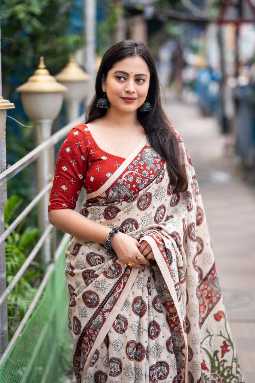 Soft linen saree with shaded style prints.