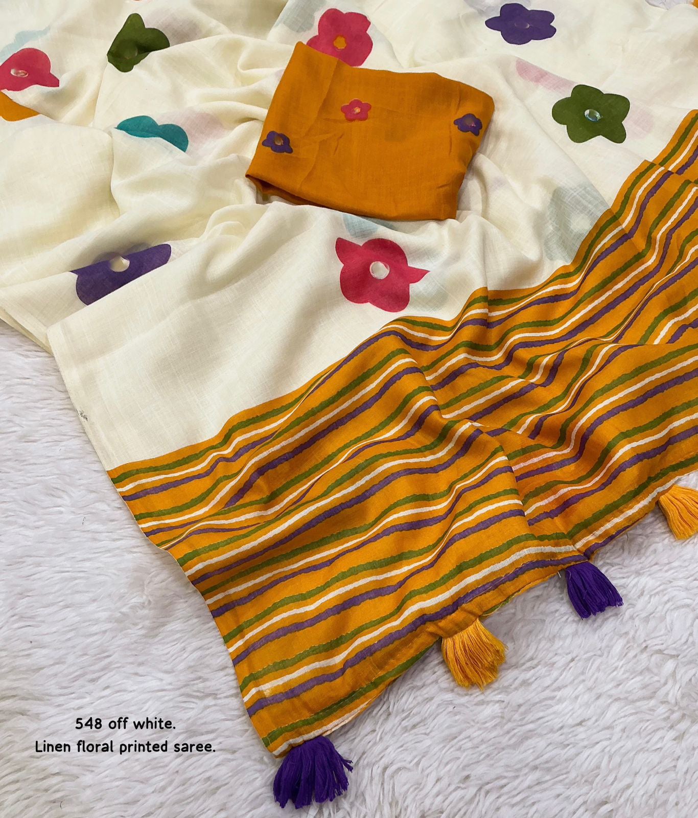 Soft linen saree with shaded style prints.