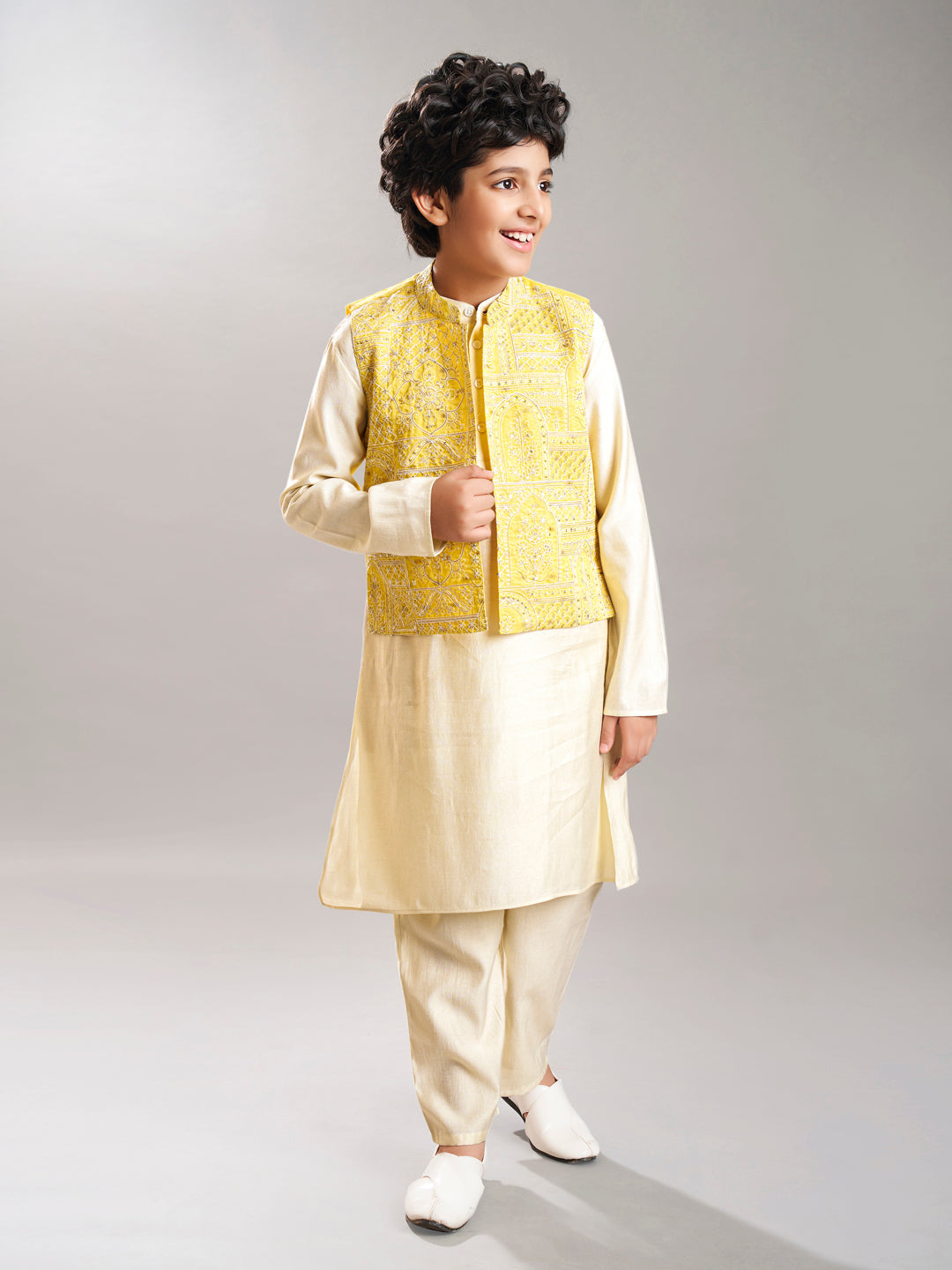 Boys off white kurta pajama with yellow modal booti jacket