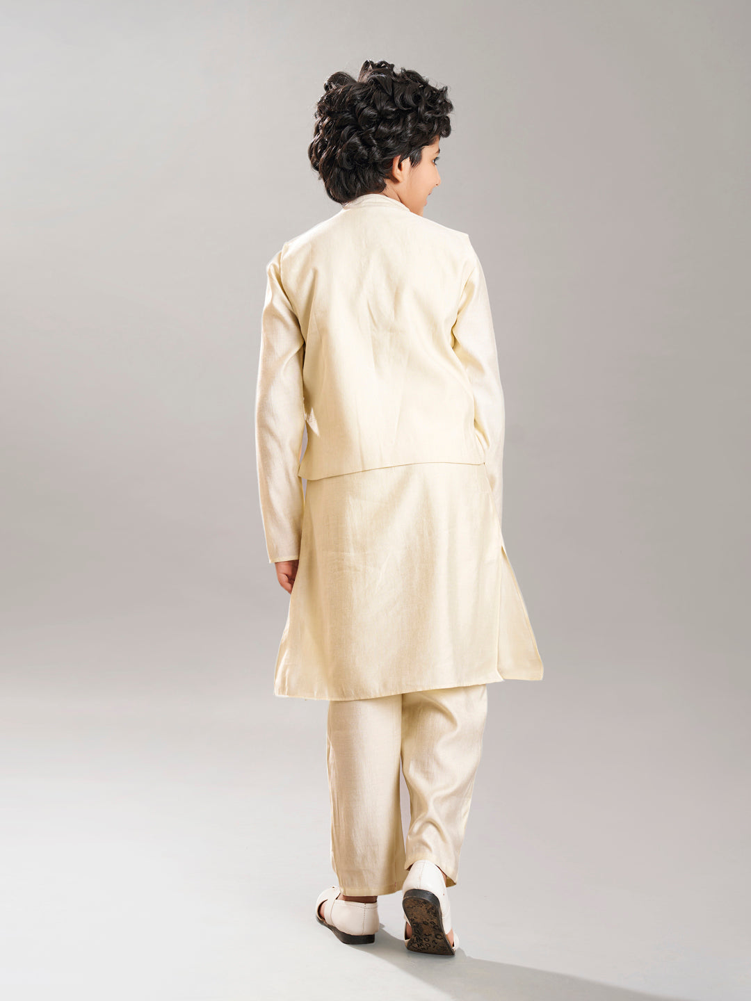 Boys off white kurta pajama with a off white embroidry jacket