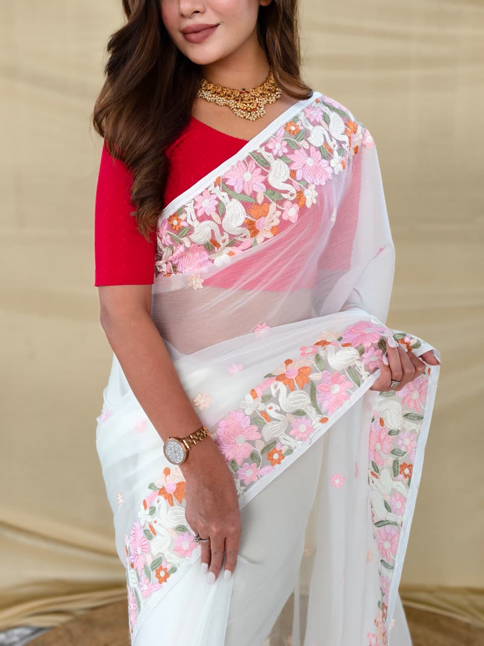 CHIFFON SAREE WITH ALL OVER DESIGNER EMBROIDERY PATTERN ALONGWITH BEAUTIFUL MOTIFS.