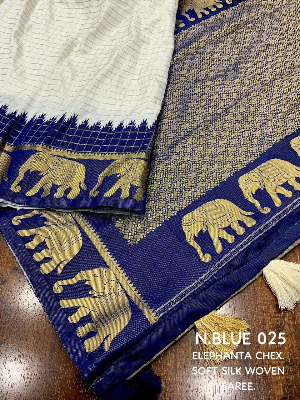 sift silk saree with zari woven chex and with elephant border and rich pallu.Cotton tasslels on pallu.