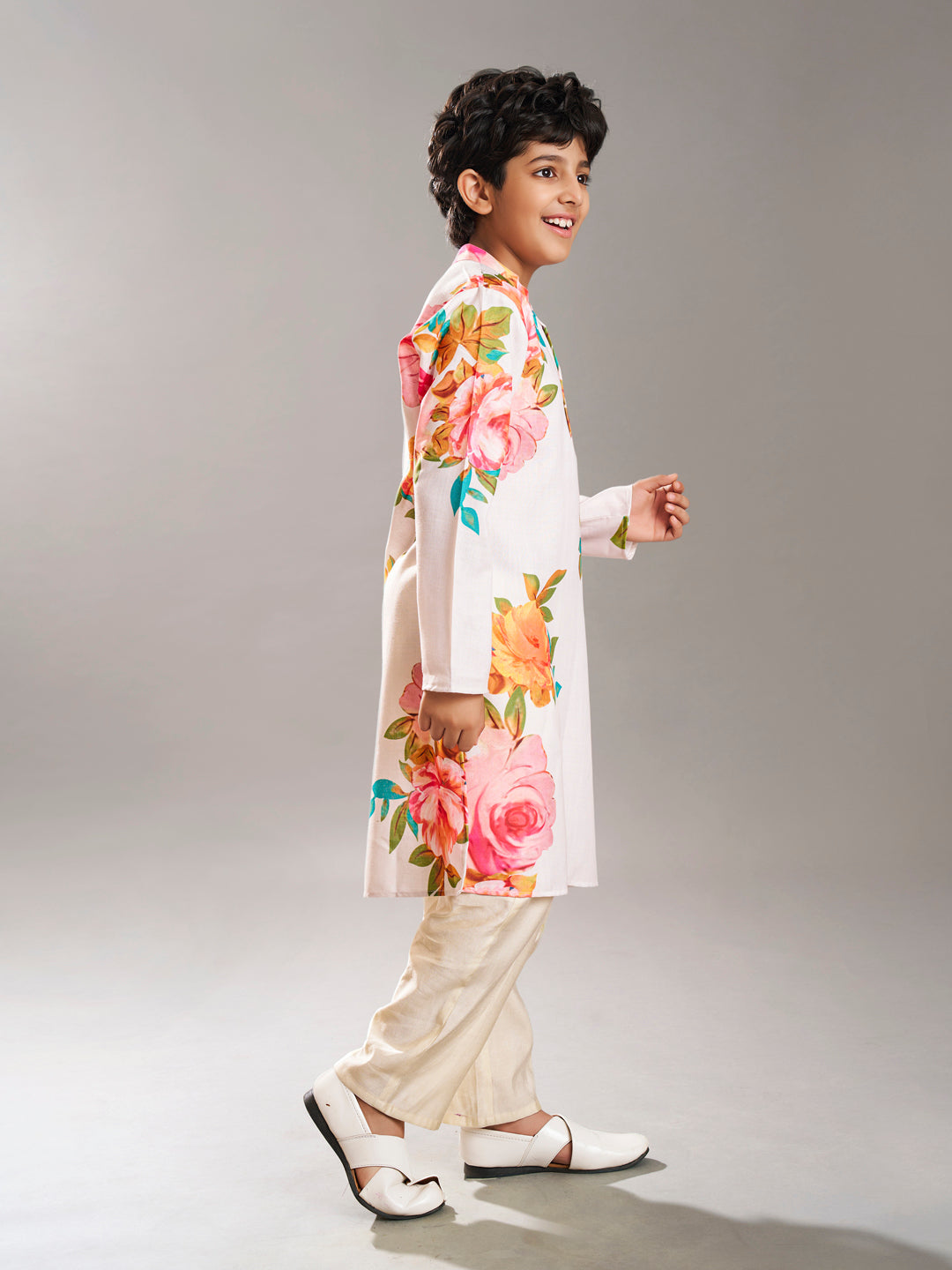 Boys off white floral printed kurta with a off white pajama
