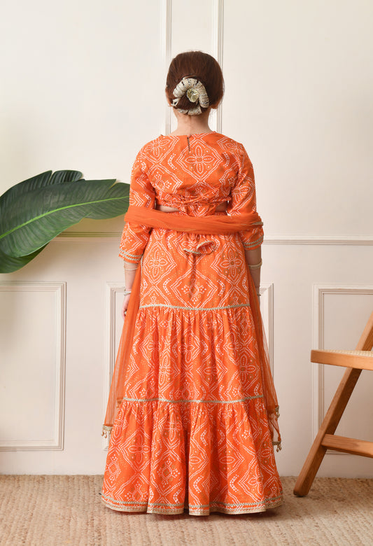 Girls Bright Orange Bandhani Printed Lehenga Choli Set with Net Dupatta