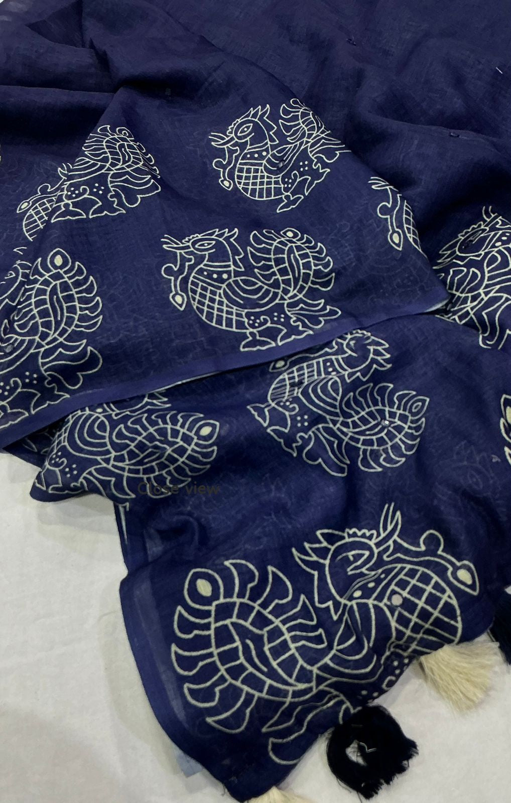 Soft linen saree with shaded style prints.