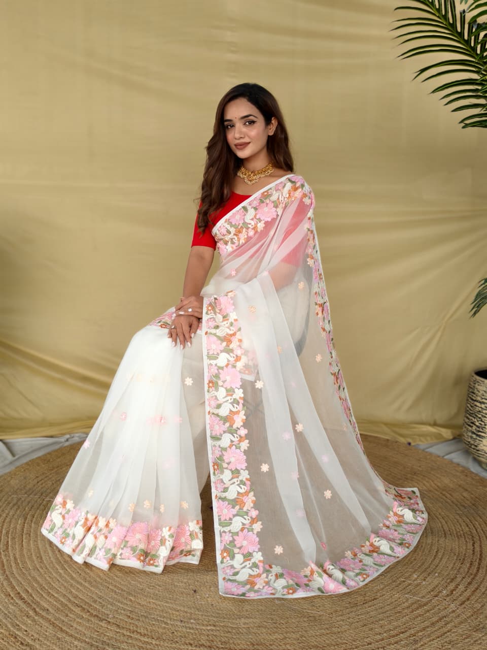 CHIFFON SAREE WITH ALL OVER DESIGNER EMBROIDERY PATTERN ALONGWITH BEAUTIFUL MOTIFS.
